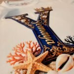 Detalle de corales, estrella de mar y caracoles del diseño de Yemayá