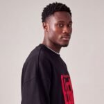 Sudadera de Eleguá color negro con diseño rojo «Máaféréfun Eleguá»