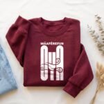 Sudadera de Oyá color vino, diseño Máaférefún Oyá – Ashekuba