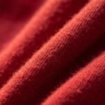 Detalle de la tela suave y gruesa de la sudadera de Shangó roja