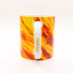 Taza de Oshún con girasoles dorados y su nombre en el asa