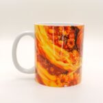 Taza de Oshún con girasoles dorados y su nombre en el asa