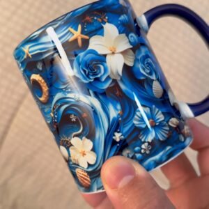 Foto real de la taza de Yemayá Ancla y flores con asa azul