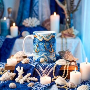 Taza de Yemayá con olas en relieve, anclas y caracoles en azul y dorado